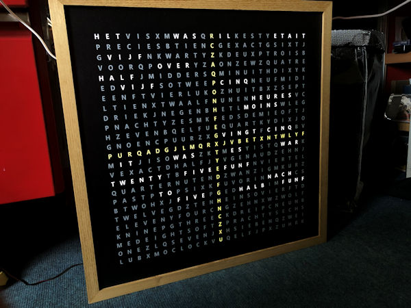 Four language clock white